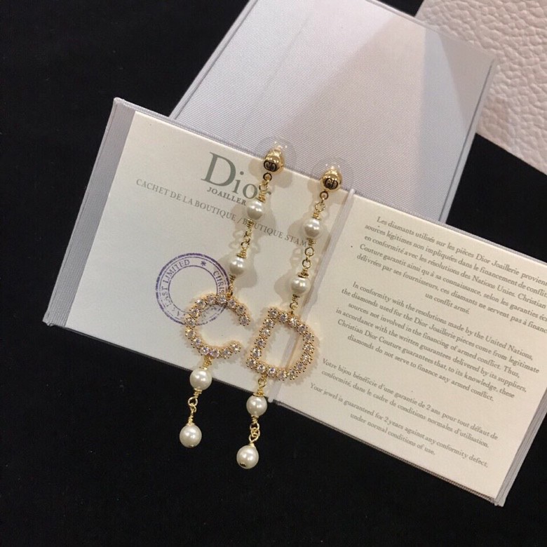 ch**an D*or earrings